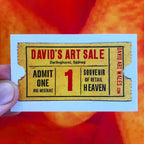 A hand holds a rectangular printed ticket or card featuring a vintage-style art sale design. The card has a yellow background with red and black text reading 'DAVID'S ART SALE,' 'Darlinghurst, Sydney,' 'ADMIT ONE BIG MISTAKE,' '1,' 'SOUVENIR OF RETAIL HEAVEN,' and 'DAVID ART WALES.