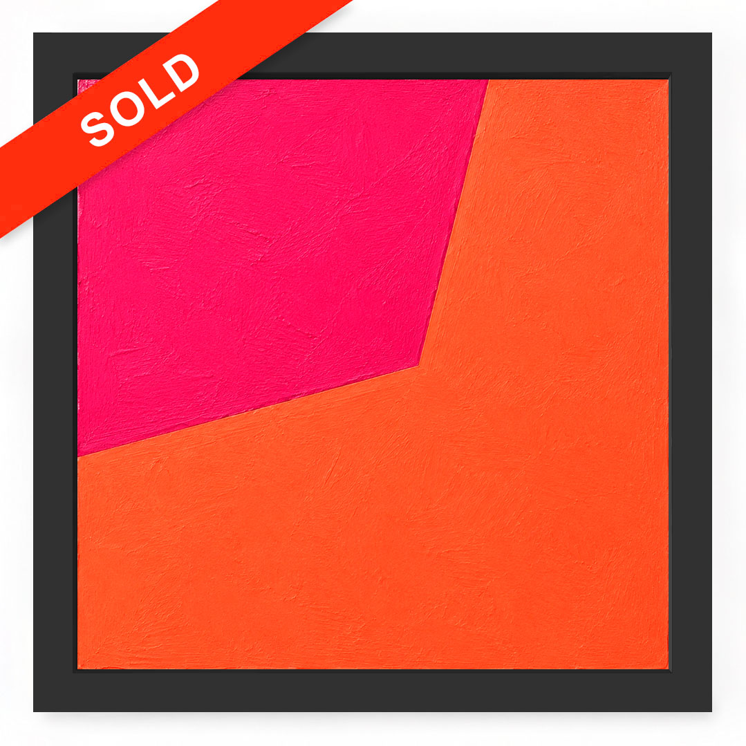A square abstract wall art piece with a thick black frame, featuring a bright orange lower-right section and a vivid pink upper-left section. A red diagonal 'SOLD' banner overlays the top-left corner.
